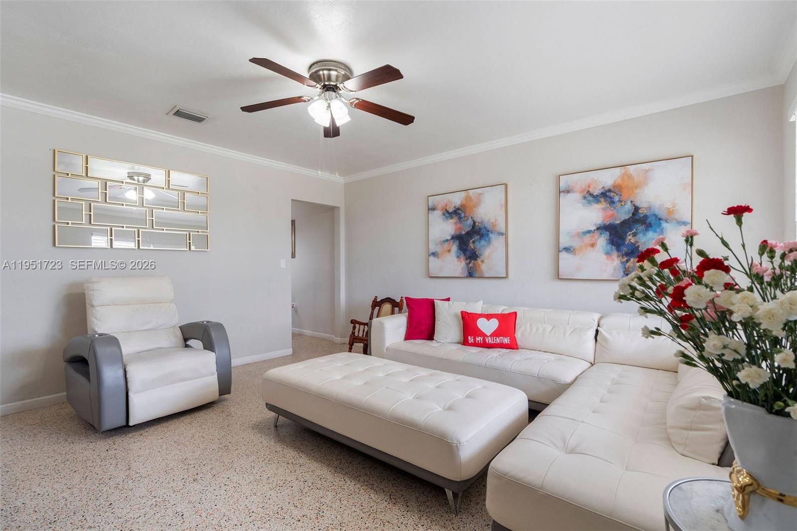 9601-9603 Southwest 36th Street Miami, FL 33165 - Photo 8 of 45 a living room with furniture and flowers