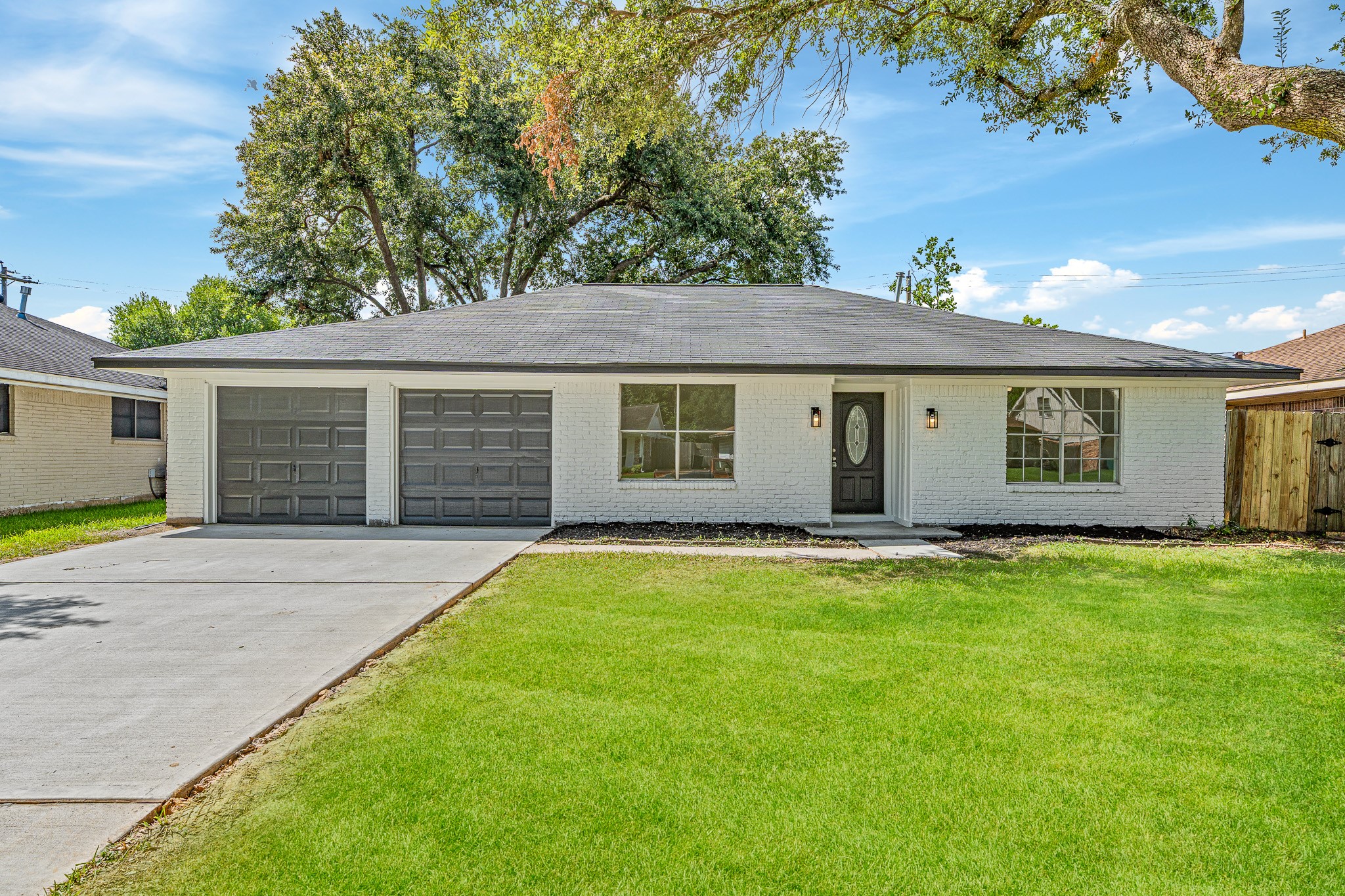 111 Princess Drive Houston, TX 77034 - Photo 2 of 30 front view of a house with a garden