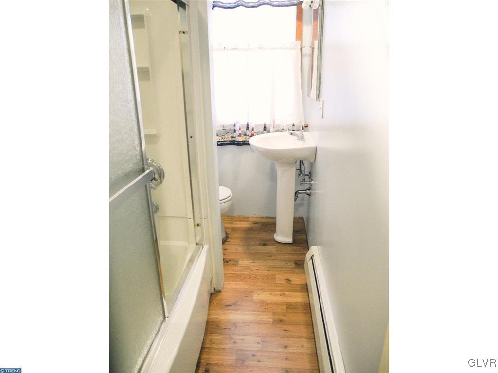 101 East Ruddle Street Coaldale, PA 18218 - Photo 15 of 22 a bathroom with a sink and a mirror