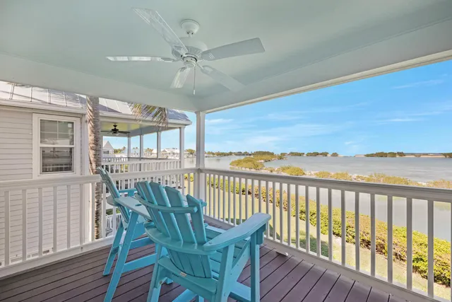 a view of a balcony with furniture