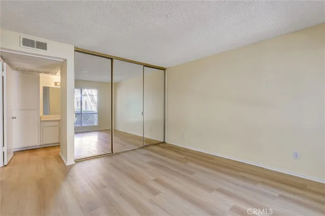 a front view of a house with a wooden fence