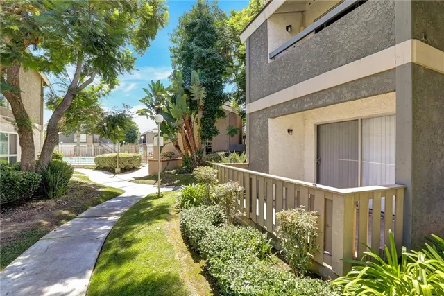 a view of a house with a garden