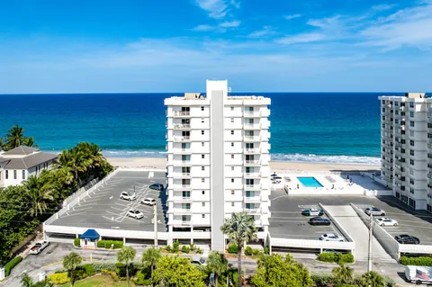 a view of swimming pool with outdoor seating