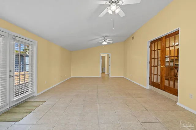 an empty room with windows