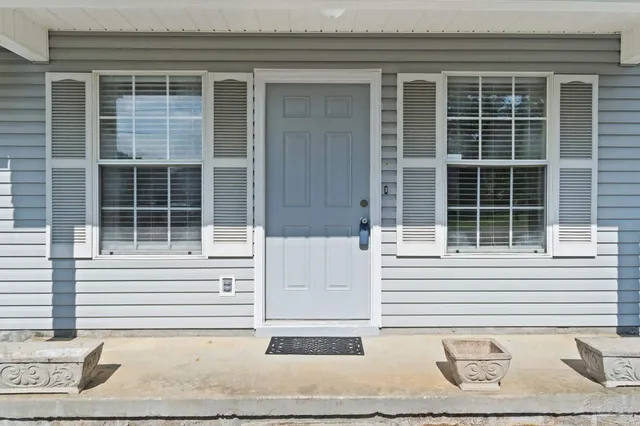 a white house with a bathtub