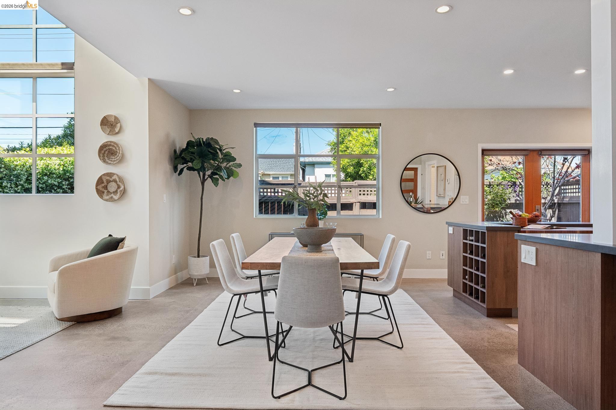 829 21st Street, Unit 1 Oakland, CA 94607 - Photo 11 of 46 a view of a livingroom with furniture and a window