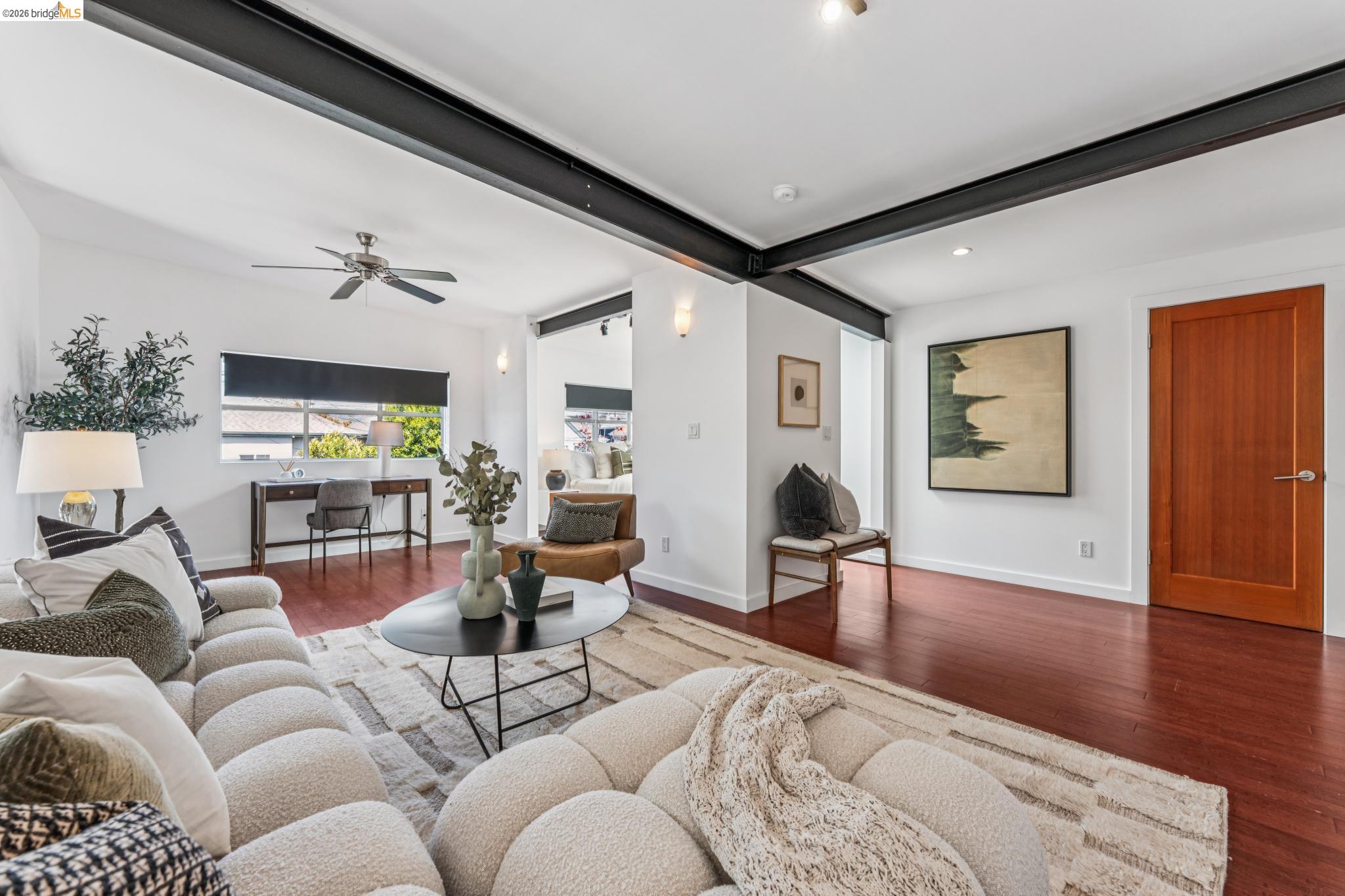 829 21st Street, Unit 1 Oakland, CA 94607 - Photo 23 of 46 a living room with furniture and wooden floor