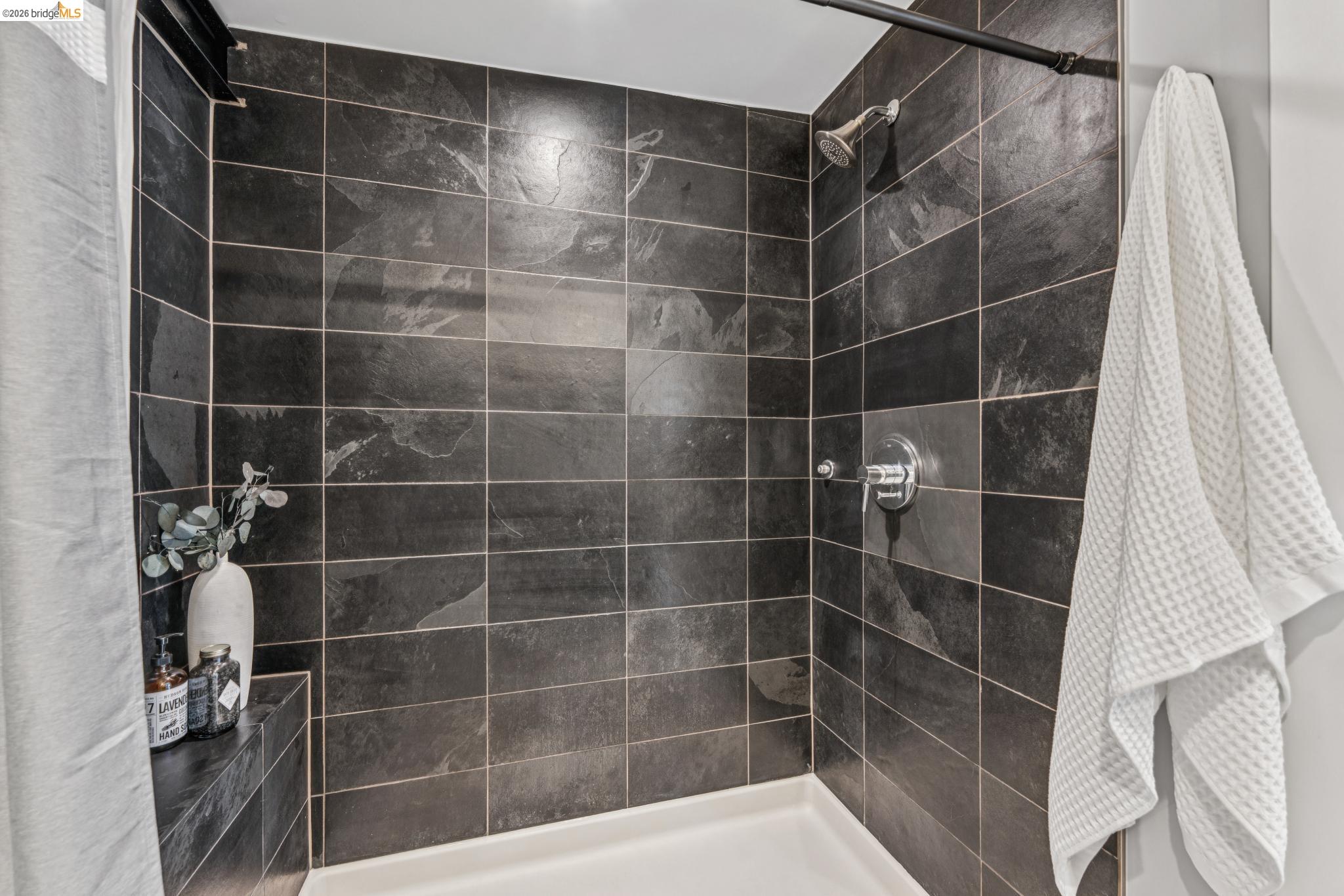 829 21st Street, Unit 1 Oakland, CA 94607 - Photo 35 of 46 a bathroom with a shower