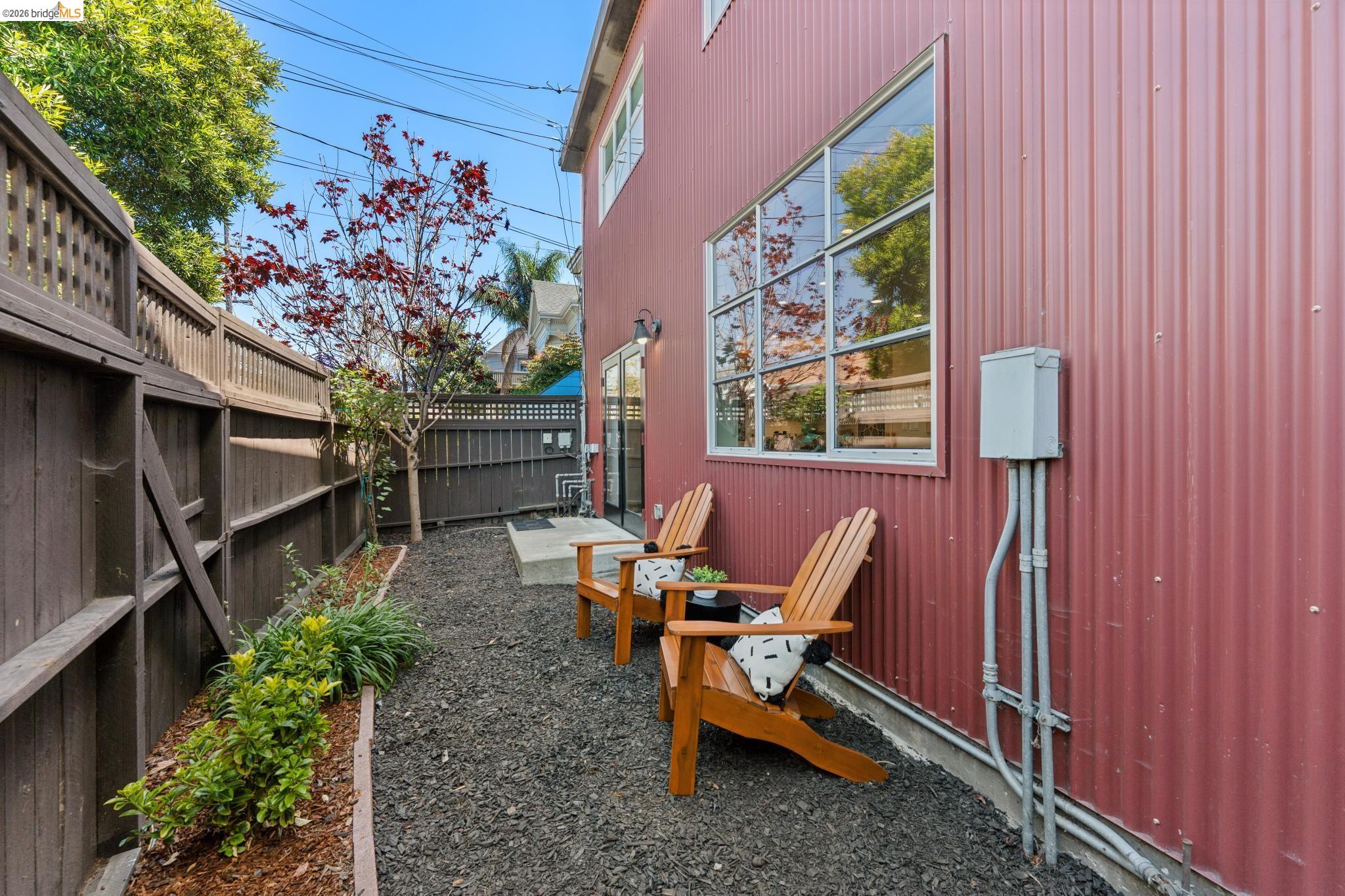 829 21st Street, Unit 1 Oakland, CA 94607 - Photo 42 of 46 a view of two chairs in the balcony