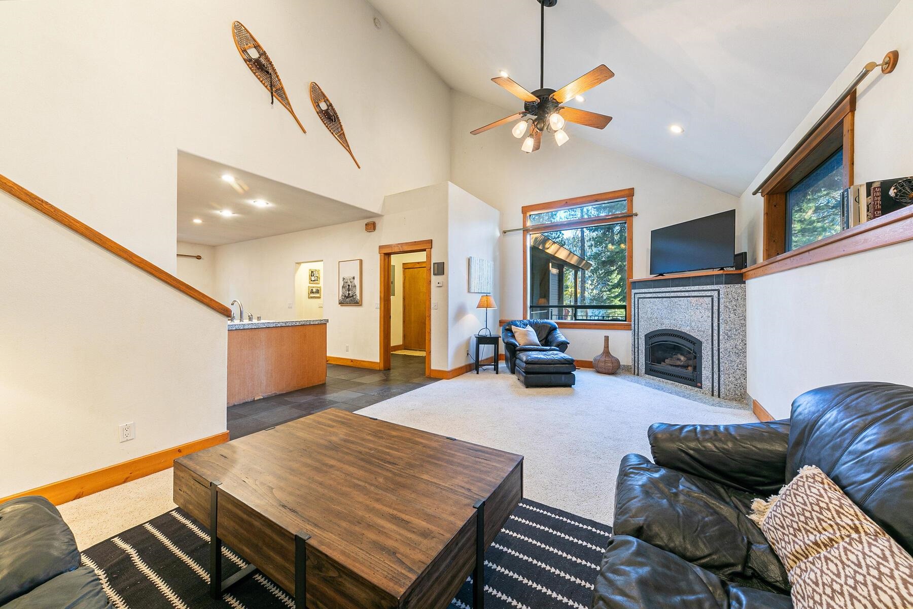 14580 Donner Pass Road Truckee, CA 96161 - Photo 14 of 27 a living room with furniture and a fireplace