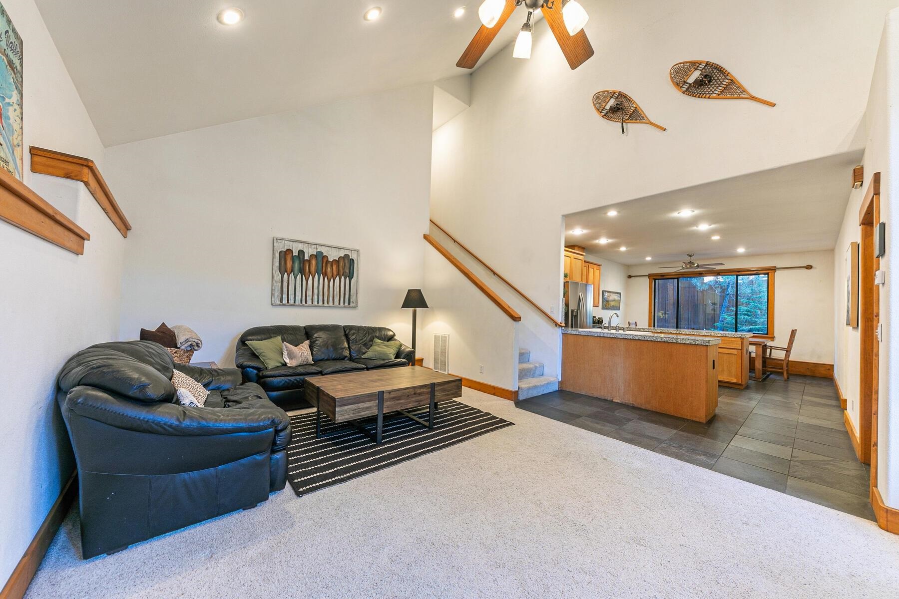 14580 Donner Pass Road Truckee, CA 96161 - Photo 15 of 27 a living room with furniture and stairs
