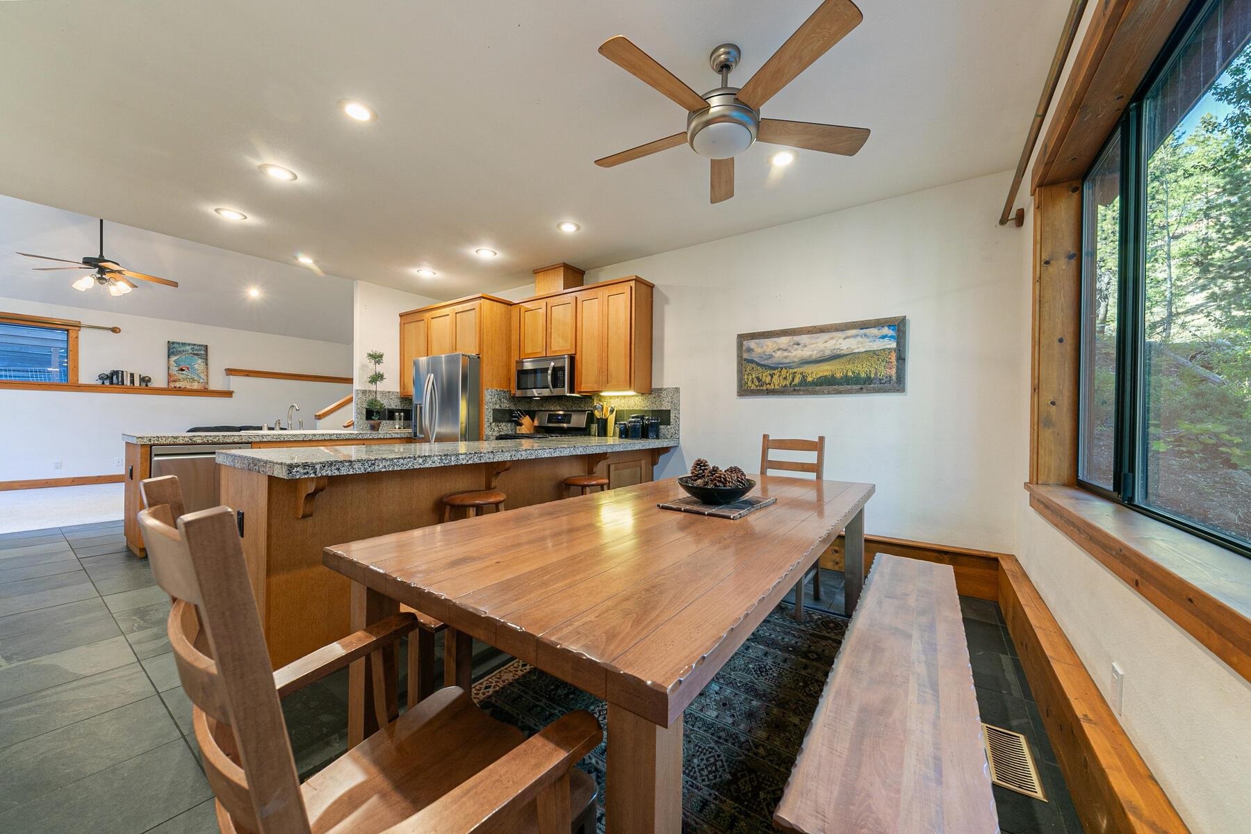 14580 Donner Pass Road Truckee, CA 96161 - Photo 18 of 27 a large kitchen with a table and chairs