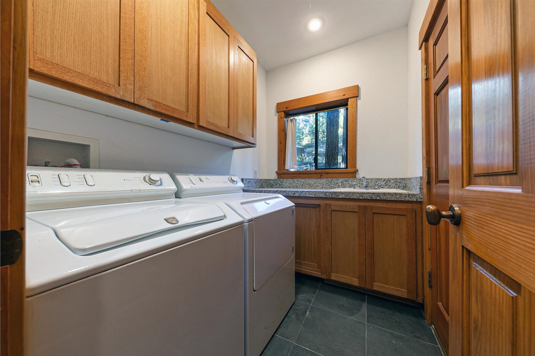 14580 Donner Pass Road Truckee, CA 96161 - Photo 24 of 27 a utility room with dryer and washer