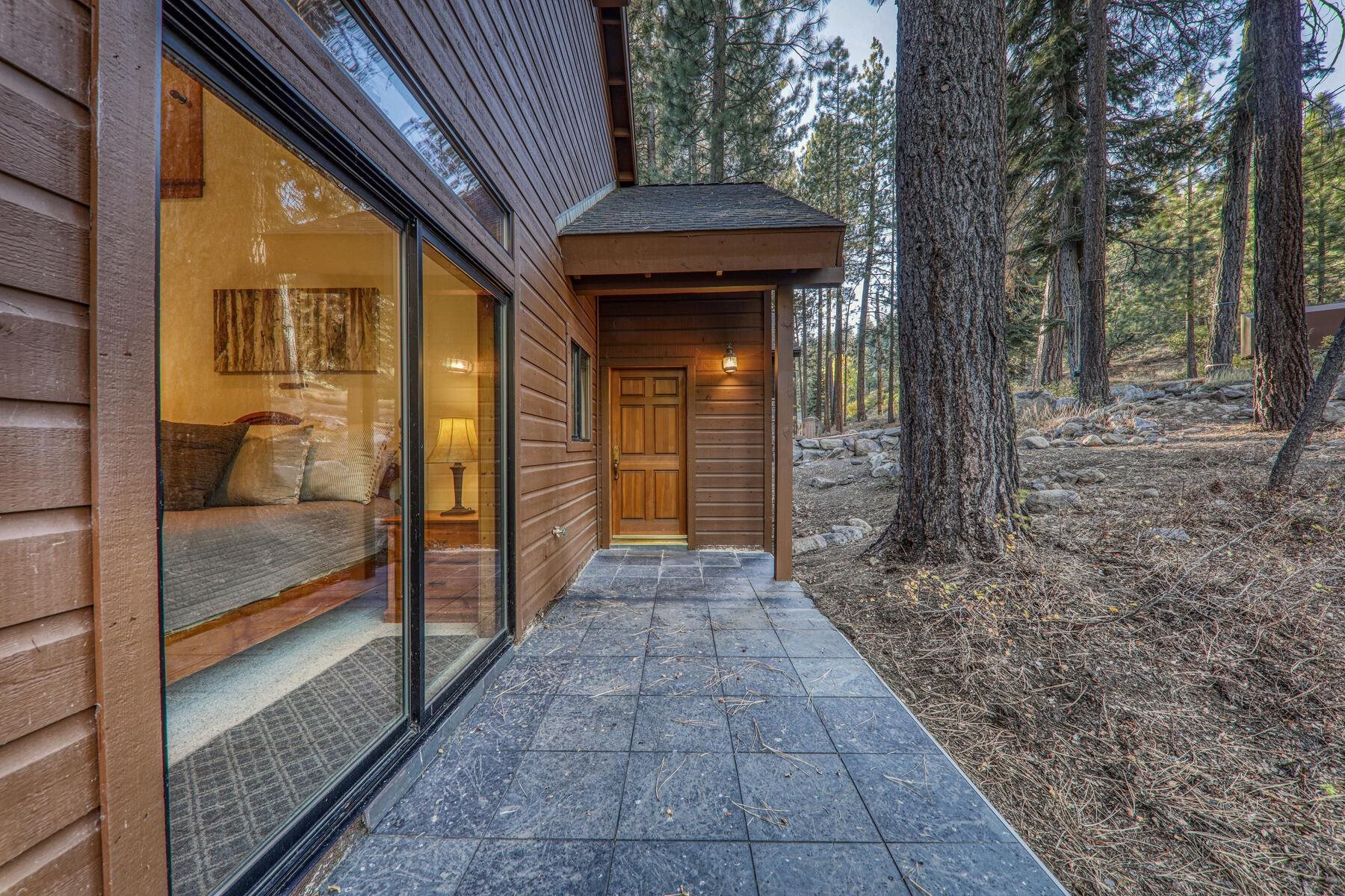 14580 Donner Pass Road Truckee, CA 96161 - Photo 25 of 27 a view of a pathway of a house with a porch