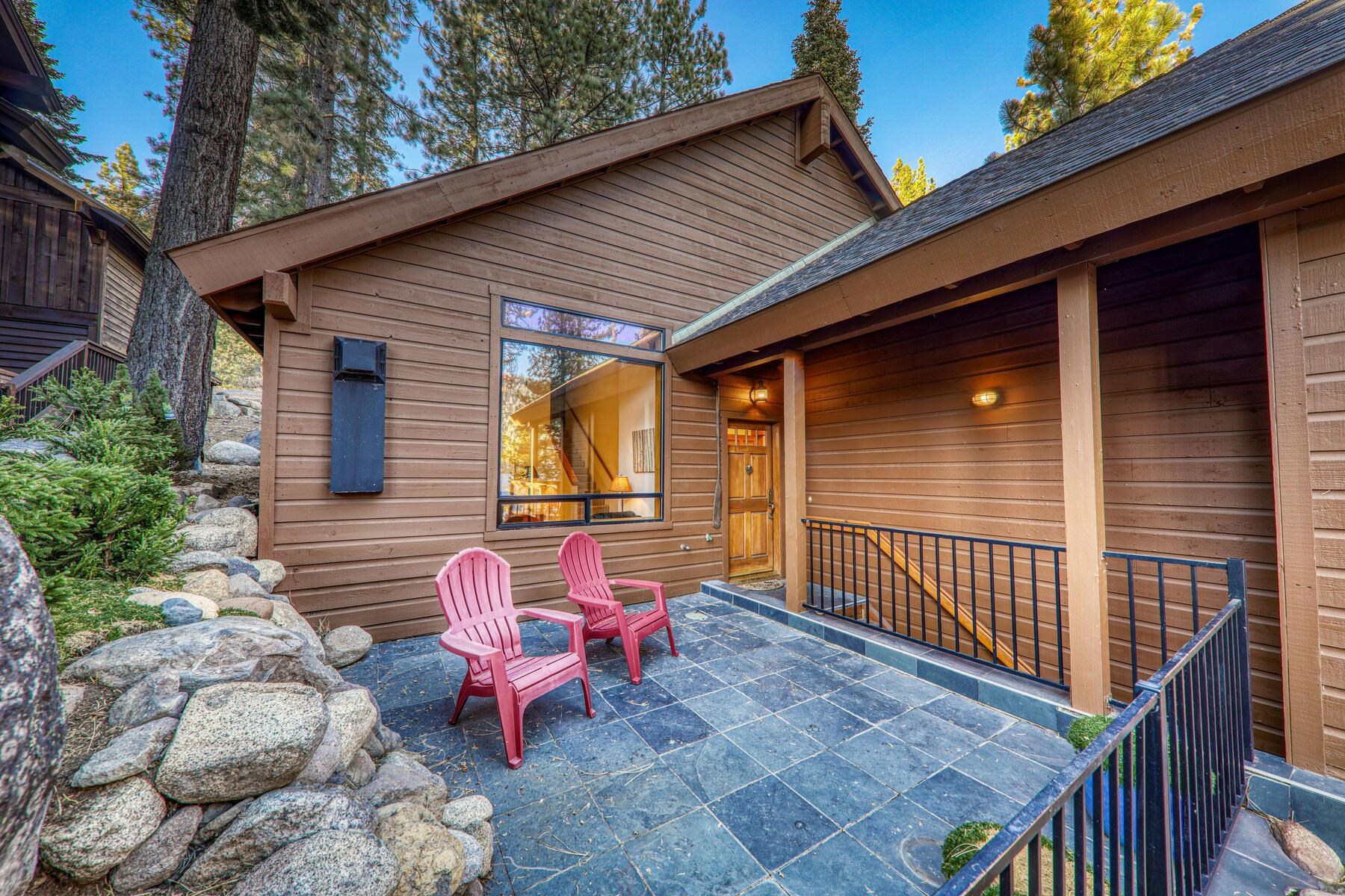 14580 Donner Pass Road Truckee, CA 96161 - Photo 5 of 27 a view of a patio with a table and chairs and wooden fence