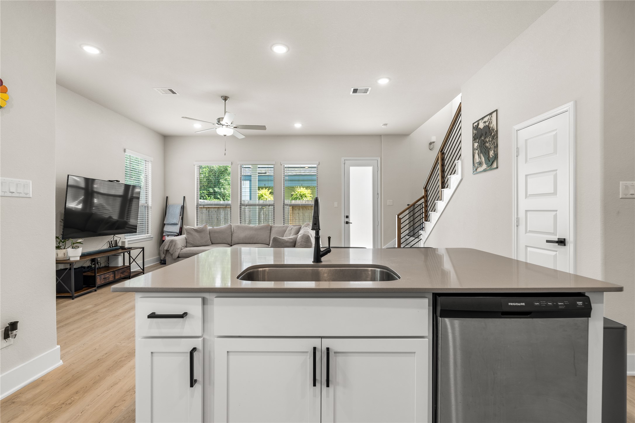 4001 Baja Lane Houston, TX 77045 - Photo 8 of 27 From the kitchen island, the home's most important spaces remain within view, creating a layout that feels connected, practical, and well-suited for everyday life.