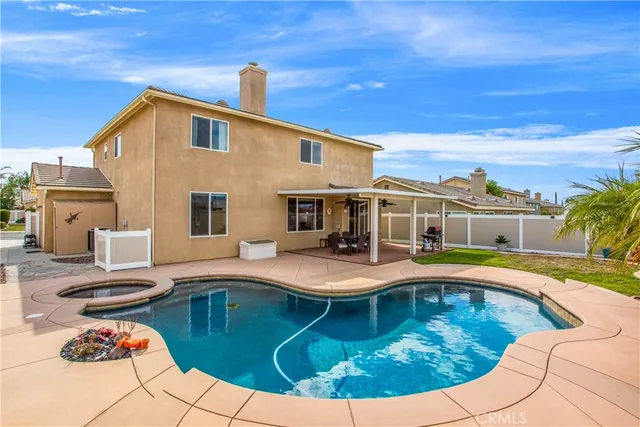 a view of a house with swimming pool