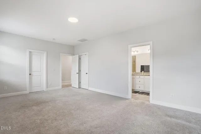 a view of an empty room and a gallery