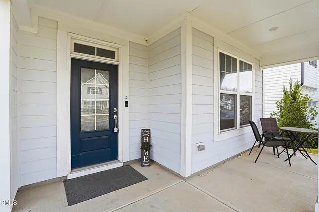 a view of livingroom with furniture and front door