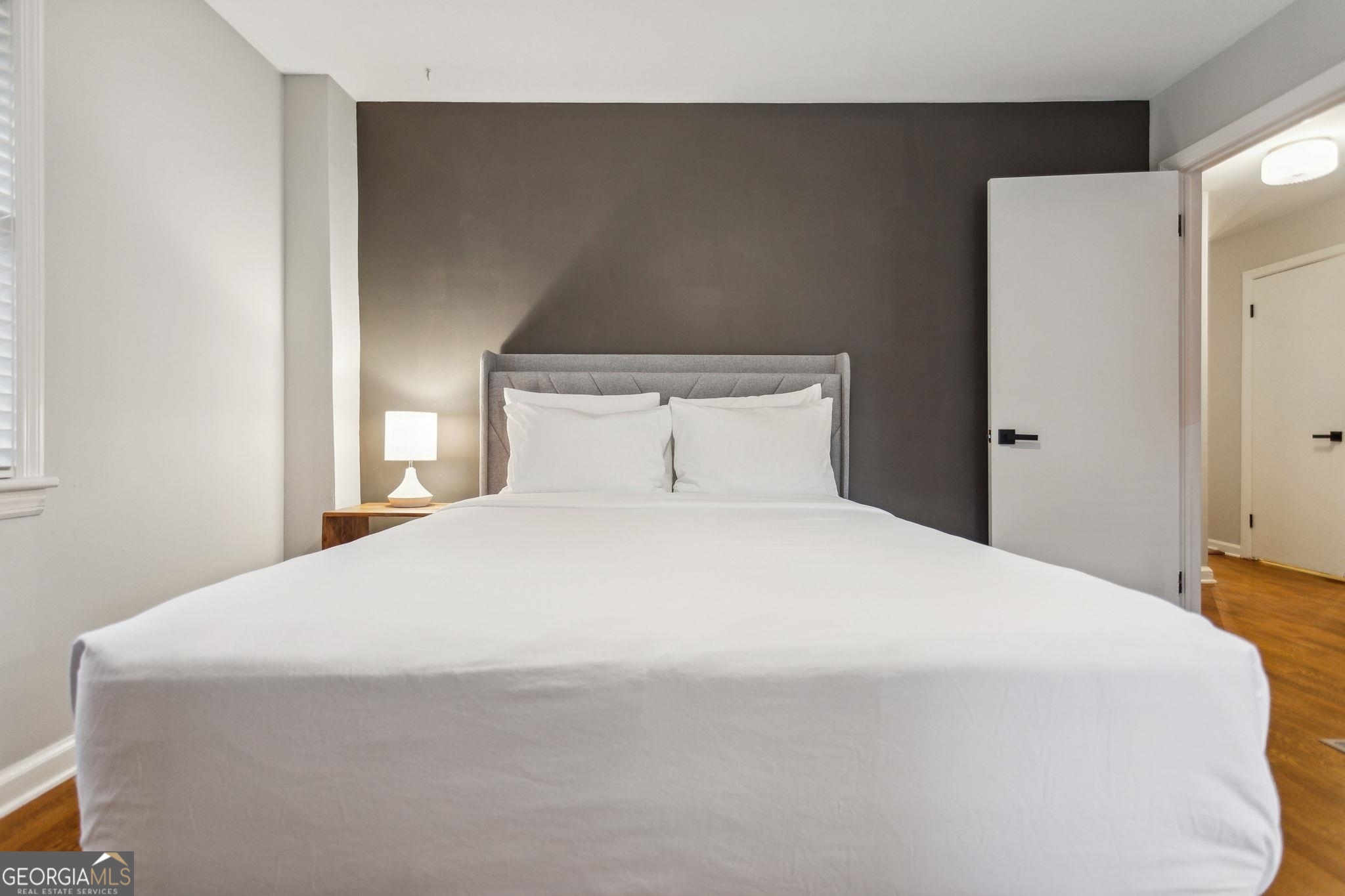 425 Plantation Road Southwest Smyrna, GA 30082 - Photo 19 of 42 a bedroom with a bed and a refrigerator