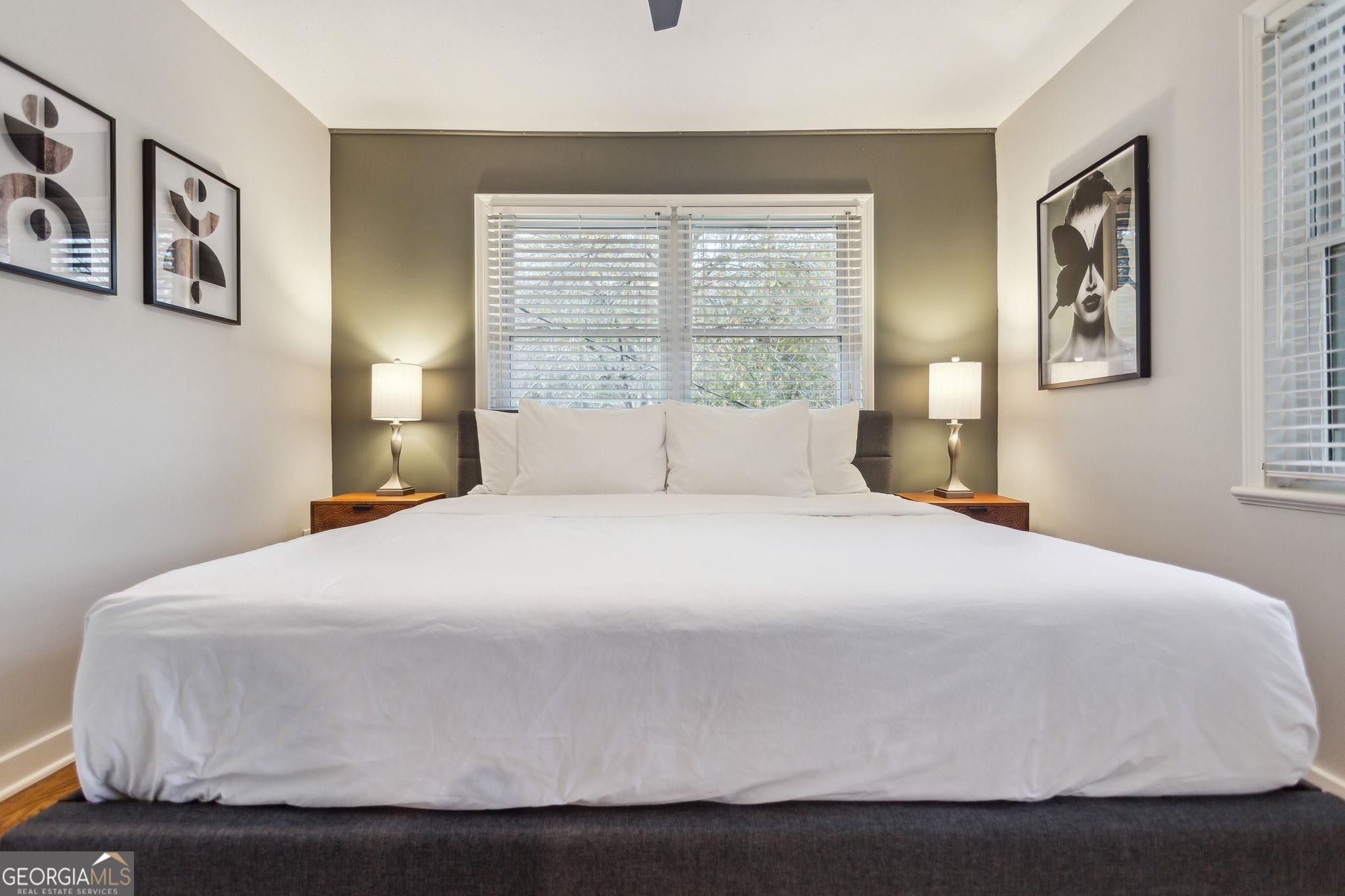 425 Plantation Road Southwest Smyrna, GA 30082 - Photo 25 of 42 a bedroom with a bed and wall painting