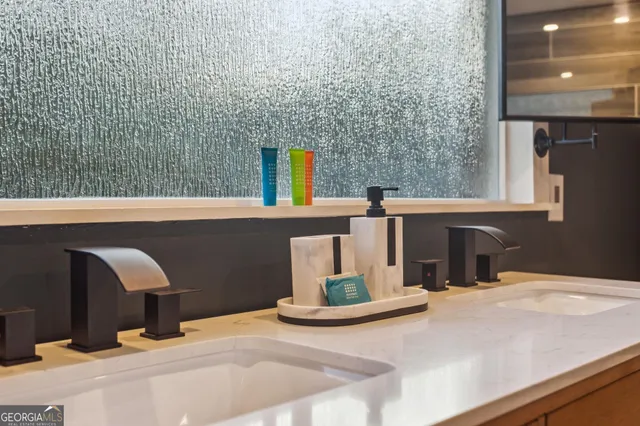 a bathroom with a shower and a toilet