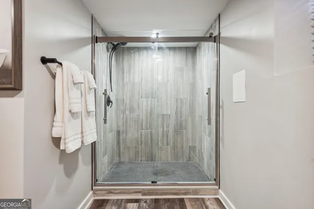 a living room with furniture and a table