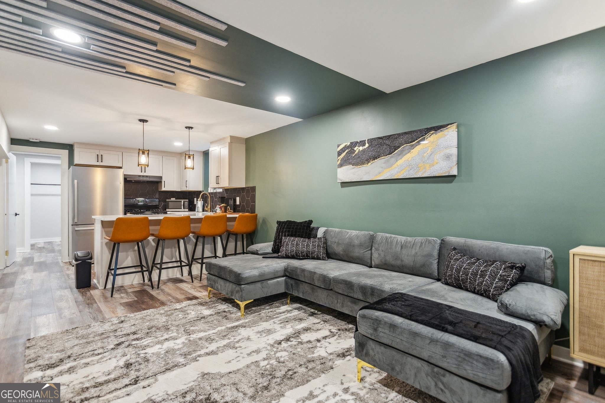 425 Plantation Road Southwest Smyrna, GA 30082 - Photo 32 of 42 a living room with furniture and a table