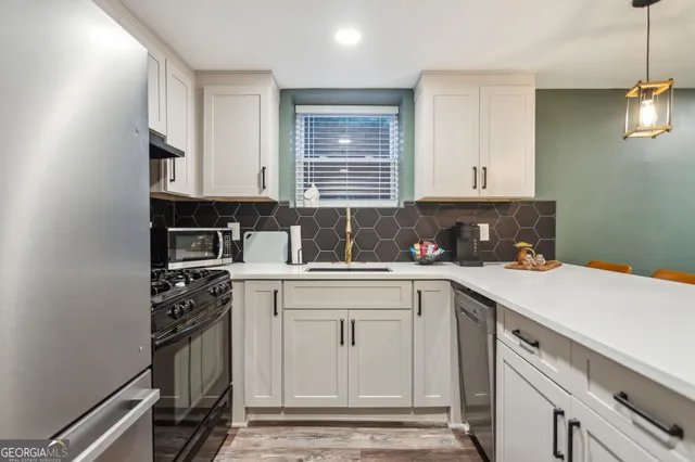 a living room with blue lights with table and chairs