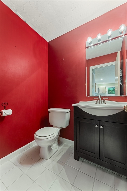 22 Arrowhead Circle, Unit 22 Ashland, MA 01721 - Photo 14 of 35 a bathroom with a sink and a toilet