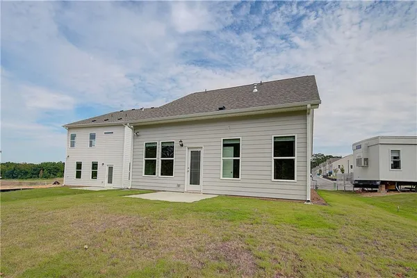 a house view with a garden space