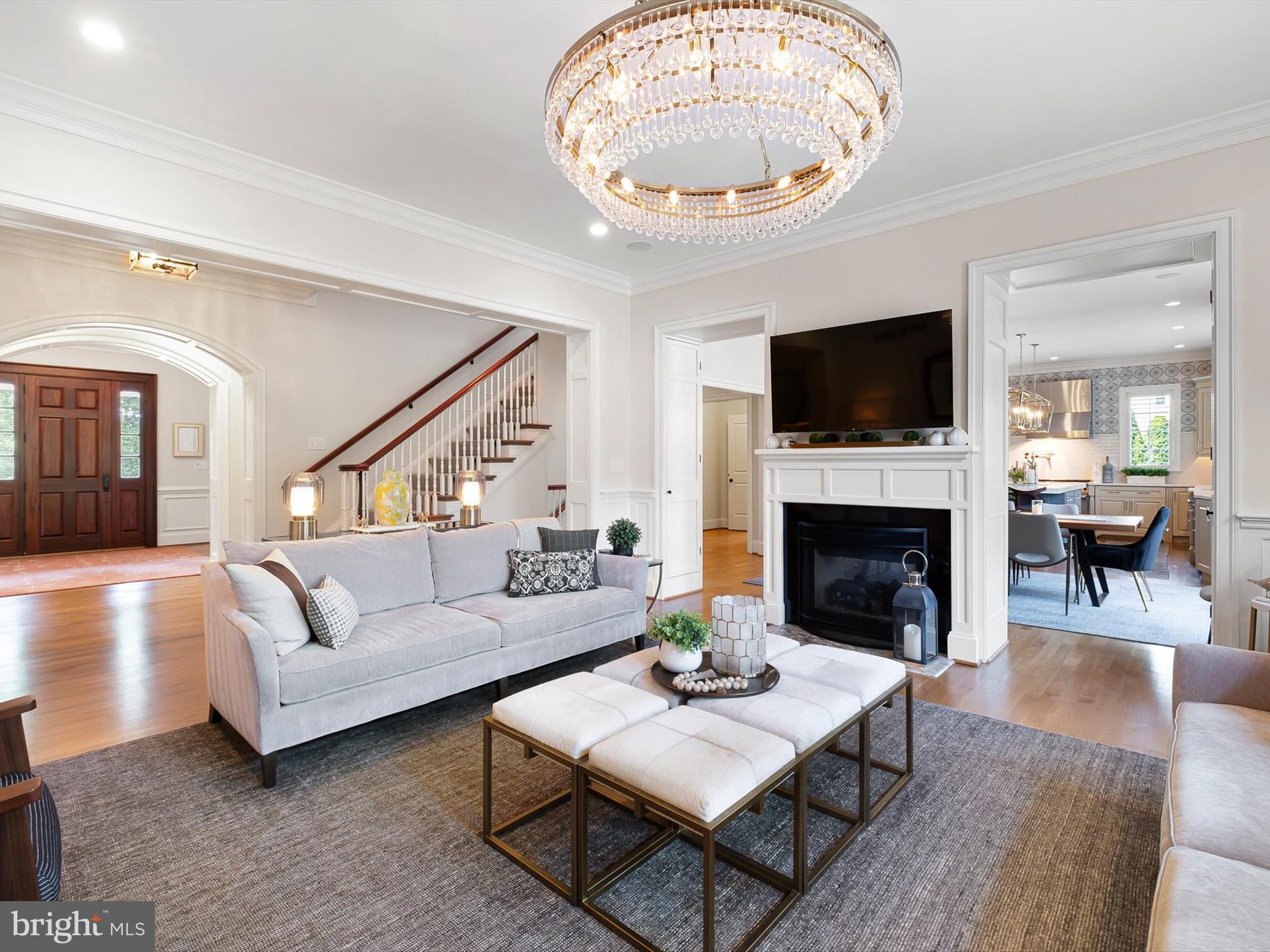 2 A Courtney Road Wilmington, DE 19807 - Photo 14 of 52 a living room with furniture a fireplace and a flat screen tv