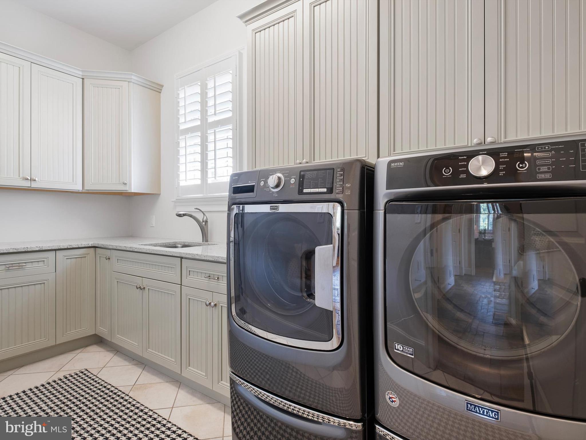 2 A Courtney Road Wilmington, DE 19807 - Photo 31 of 52 a utility room with wooden floor washer and dryer