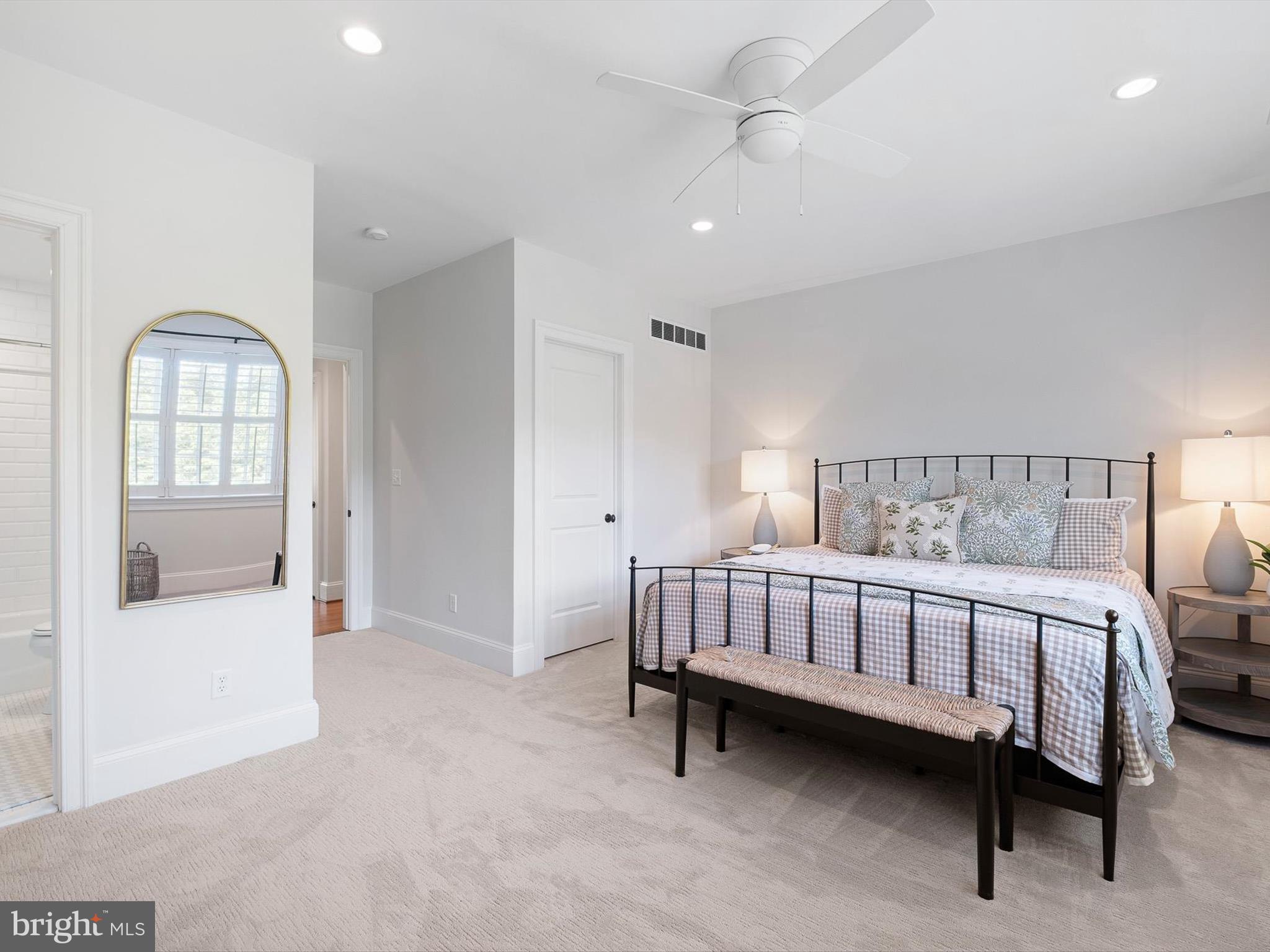 2 A Courtney Road Wilmington, DE 19807 - Photo 42 of 52 a spacious bedroom with a bed and a couch