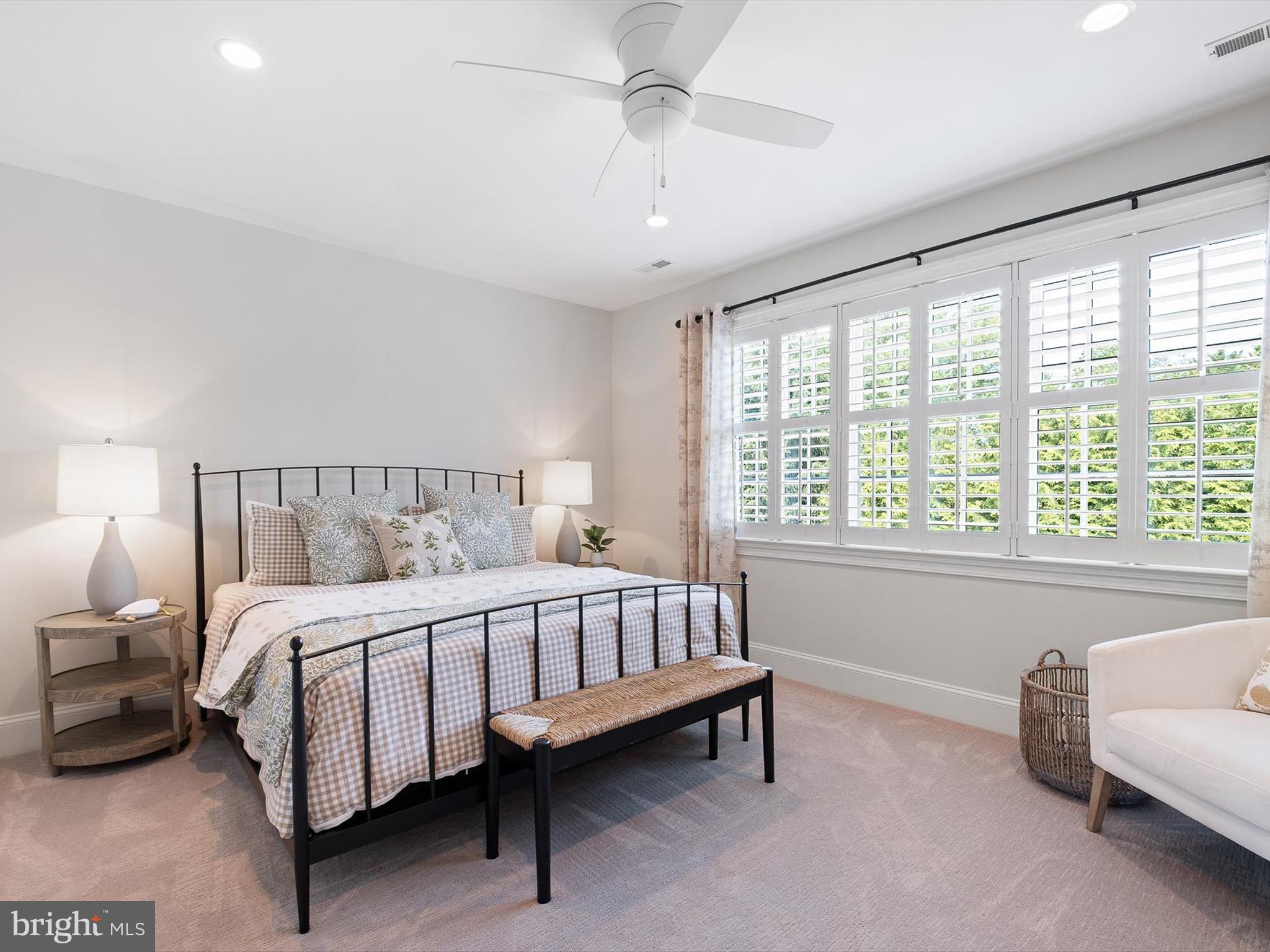 2 A Courtney Road Wilmington, DE 19807 - Photo 43 of 52 a large bed sitting in a bedroom next to a window