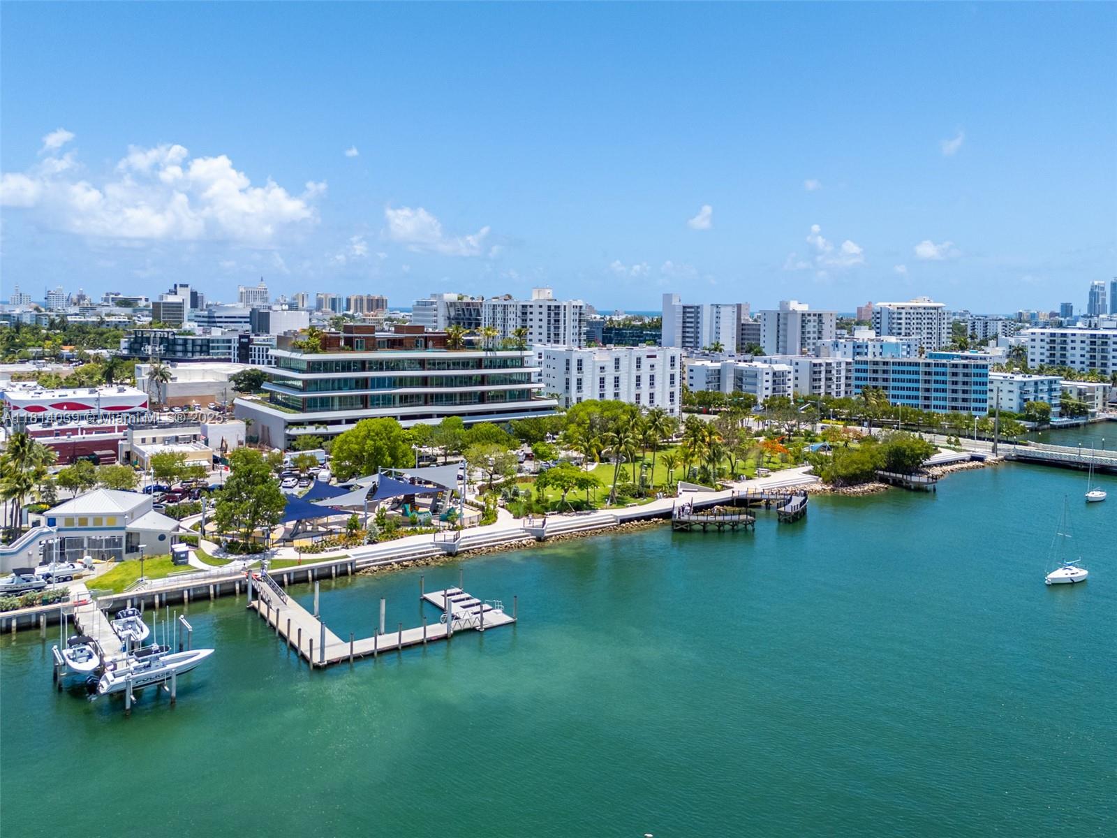1670 Lincoln Court, Unit 2B Miami Beach, FL 33139 - Photo 23 of 24 a view of a swimming pool with lounge chair
