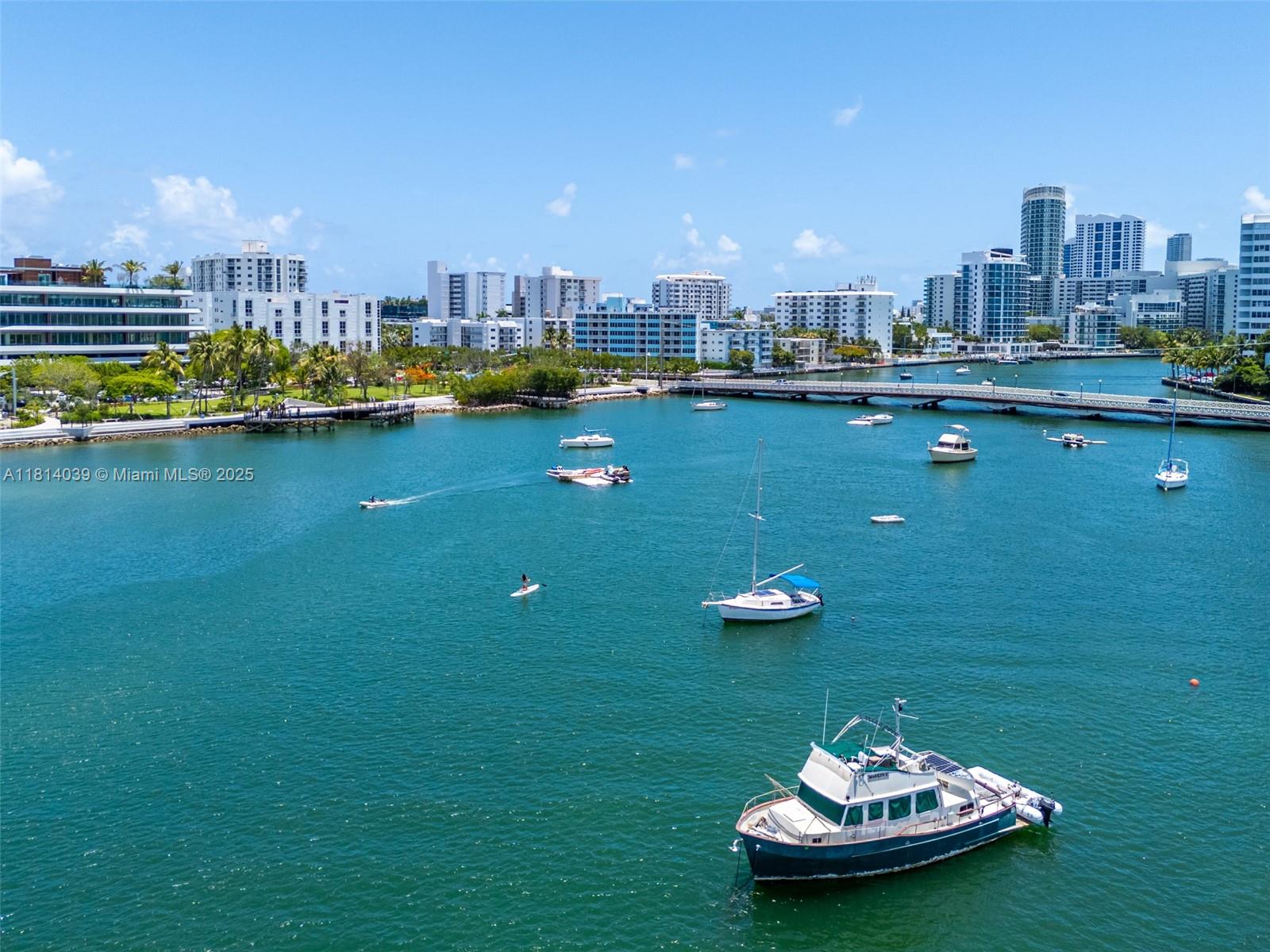1670 Lincoln Court, Unit 2B Miami Beach, FL 33139 - Photo 24 of 24 a view of a lake with a table and chairs