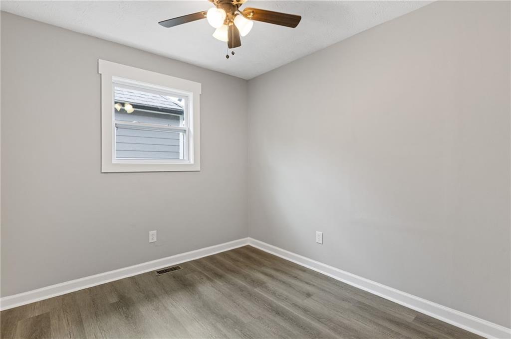 1164 Red Oak Cove Tucker, GA 30084 - Photo 16 of 24 an empty room with a window