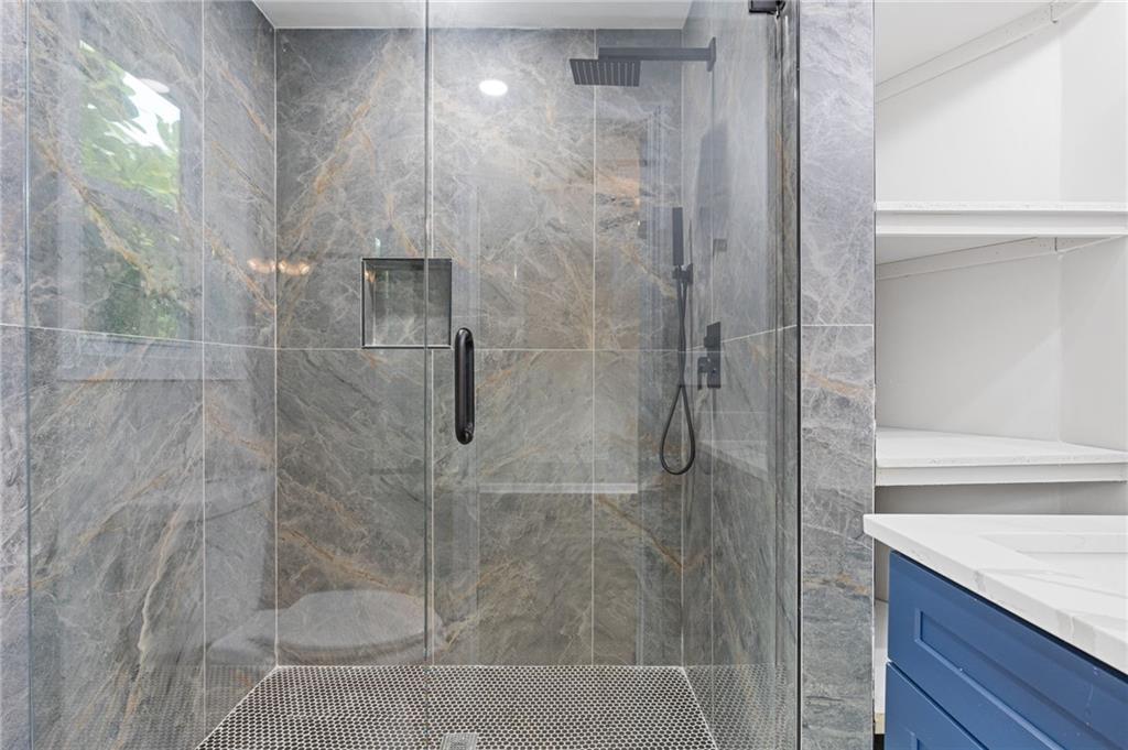 1164 Red Oak Cove Tucker, GA 30084 - Photo 20 of 24 a bathroom with a shower