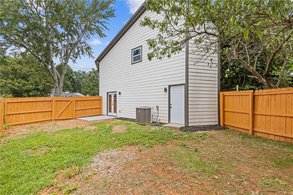 1164 Red Oak Cove Tucker, GA 30084 - Photo 22 of 24 a view of a backyard