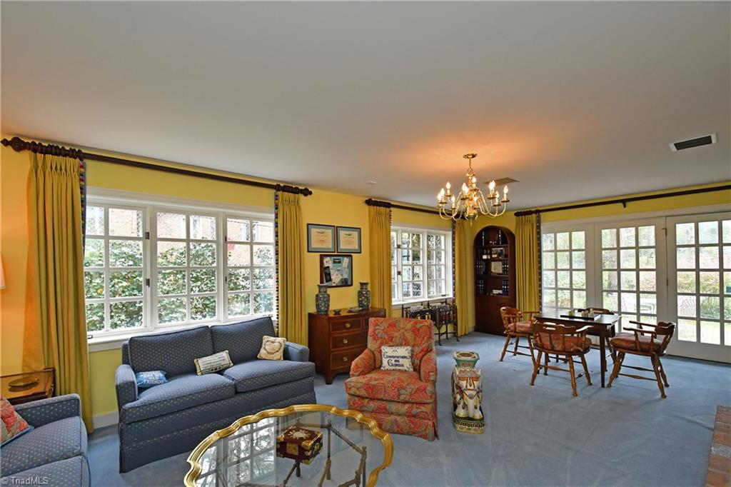 1930 Virginia Road Winston-Salem, NC 27104 - Photo 22 of 30 Den on lower level is light-filled and opens to patio