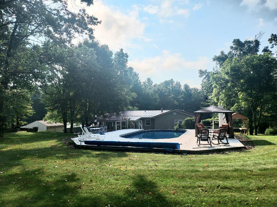 23616 15 Mile Road Big Rapids, MI 49307 - Photo 68 of 79 23616 15 Mile Pool view