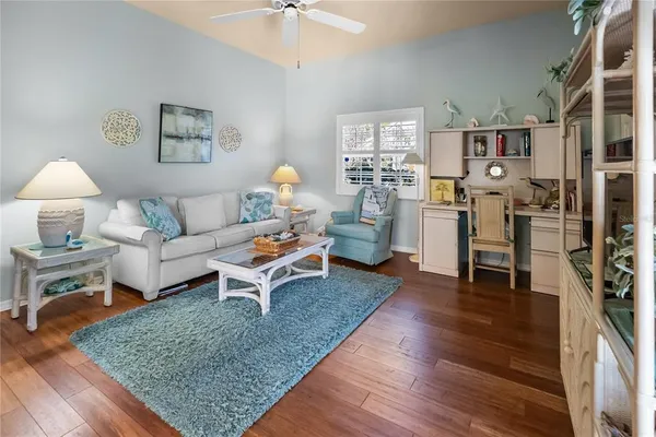 a living room with furniture and a table