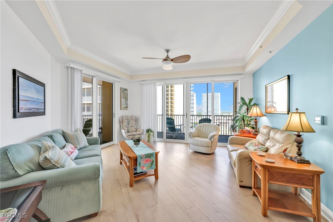 2743 First Street, Unit 1206 Fort Myers, FL 33916 - Photo 12 of 50 a living room with furniture or couch and a window