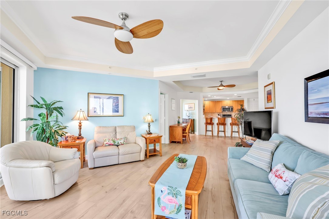 2743 First Street, Unit 1206 Fort Myers, FL 33916 - Photo 15 of 50 a living room with furniture and a large window