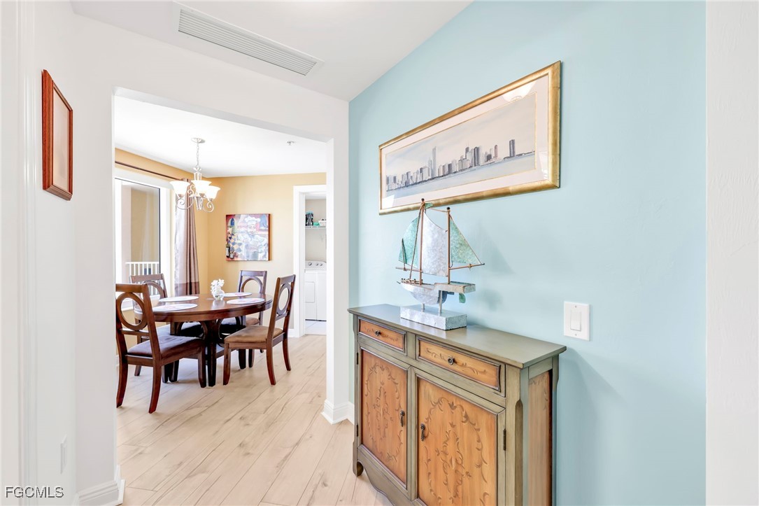 2743 First Street, Unit 1206 Fort Myers, FL 33916 - Photo 16 of 50 a dining room with furniture and window