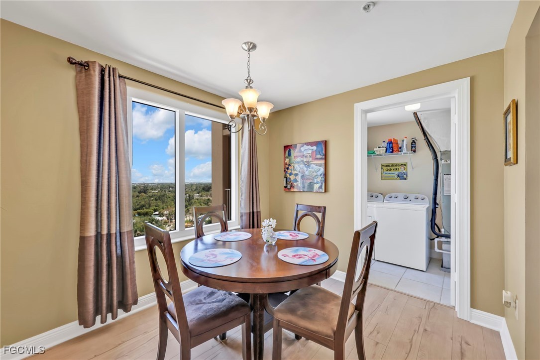 2743 First Street, Unit 1206 Fort Myers, FL 33916 - Photo 19 of 50 a view of a dining room with furniture window and outside view