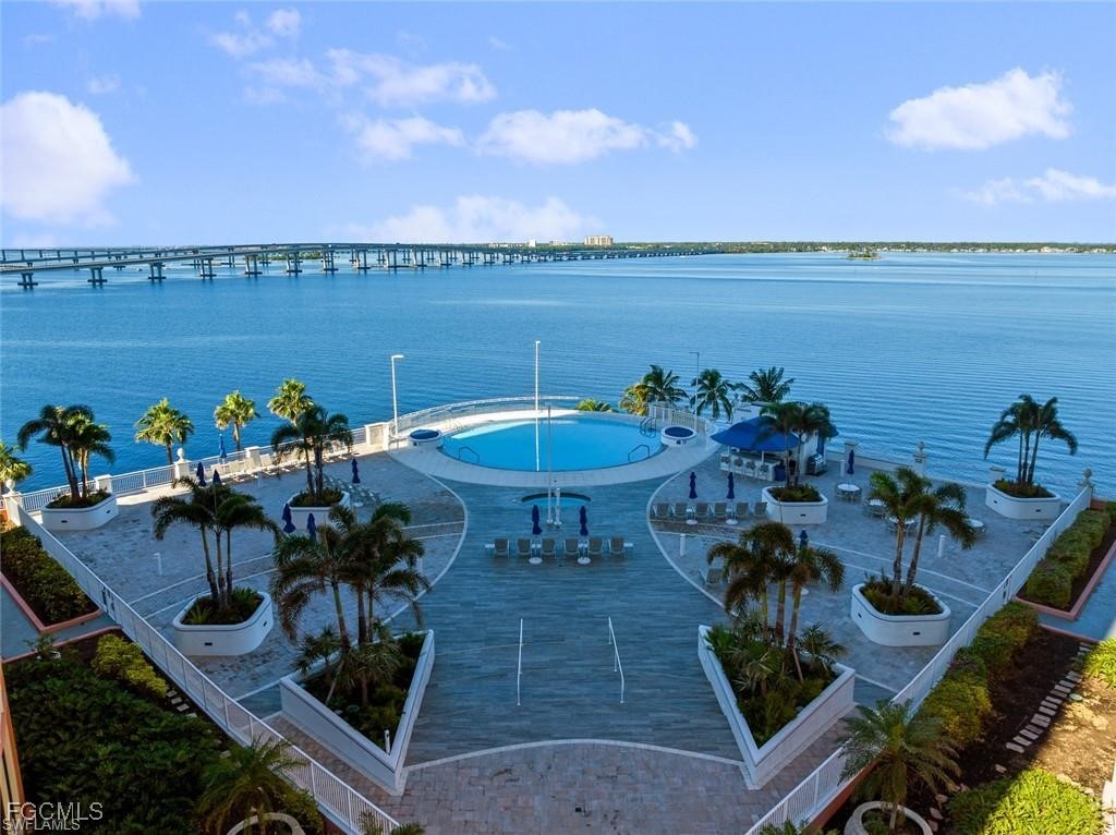 2743 First Street, Unit 1206 Fort Myers, FL 33916 - Photo 2 of 50 a view of a chairs and table on the terrace