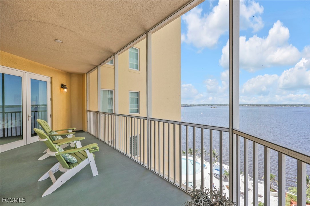 2743 First Street, Unit 1206 Fort Myers, FL 33916 - Photo 34 of 50 a view of a porch with furniture