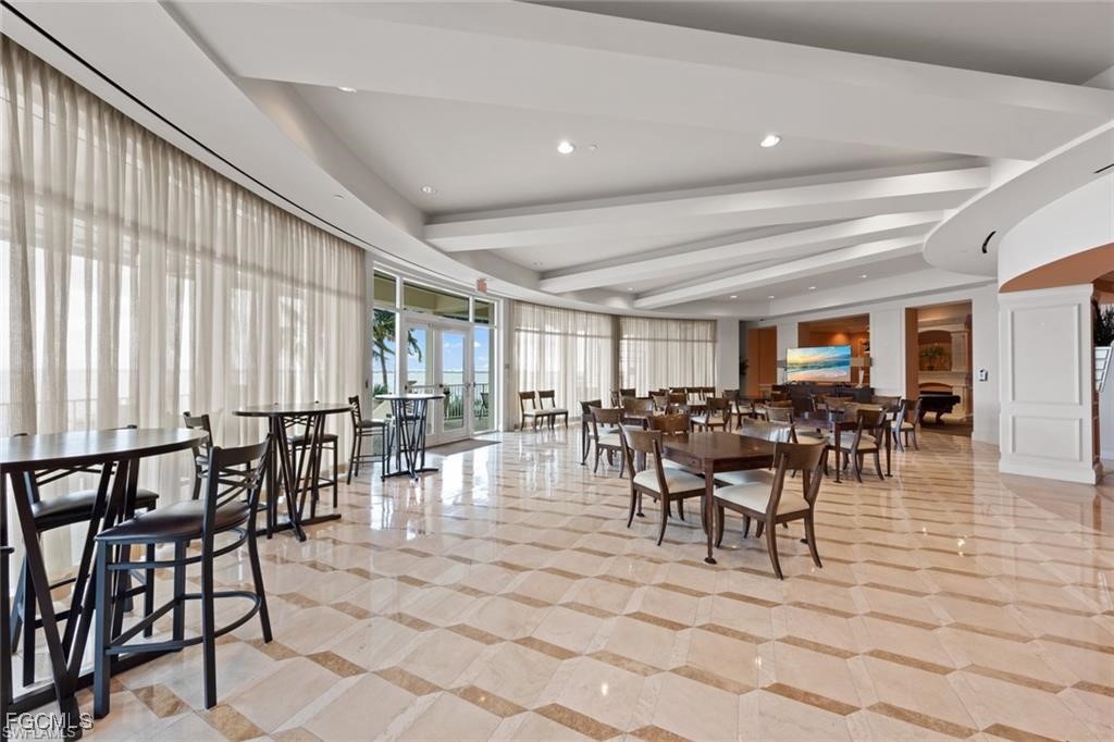 2743 First Street, Unit 1206 Fort Myers, FL 33916 - Photo 50 of 50 a view of a dining room with furniture window and chairs